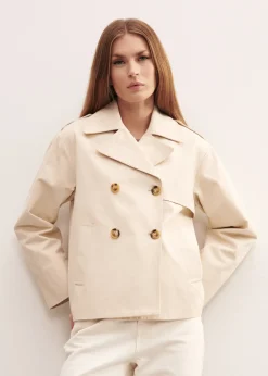 Dwurzędowy kremowy trencz damski